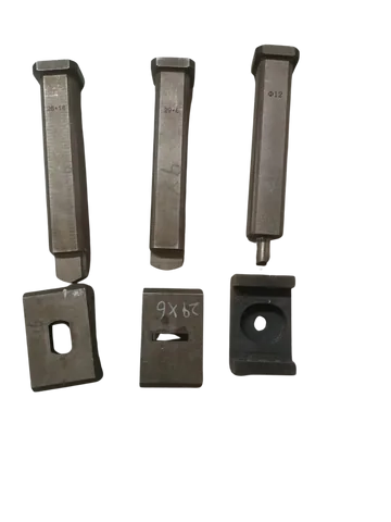 Three long square shank purlin punches with their slotted dies.